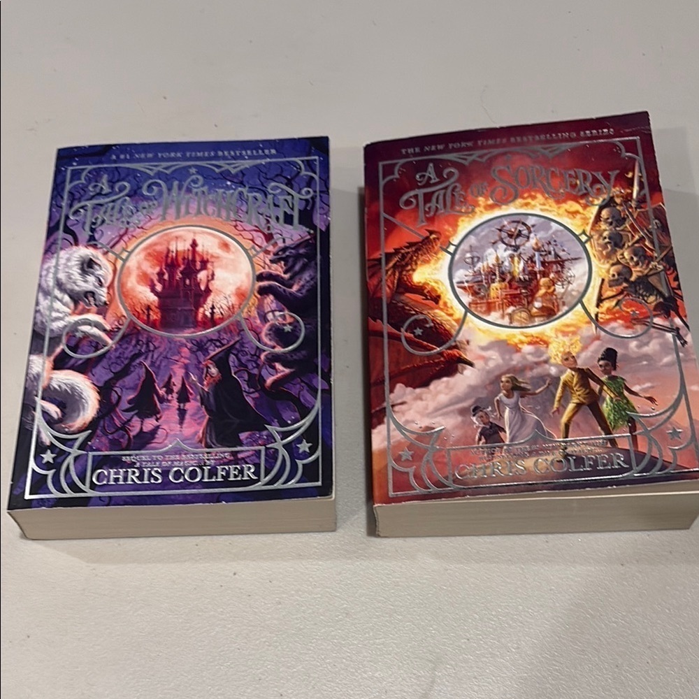 2 books from the Tale of Magic series by Chris Colfer.